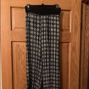 Black and white side leg pants with stretch band.